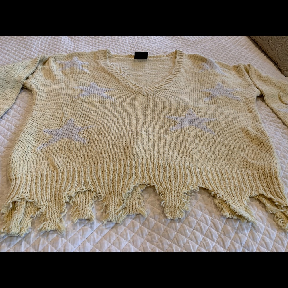Blank page yellow star sweater